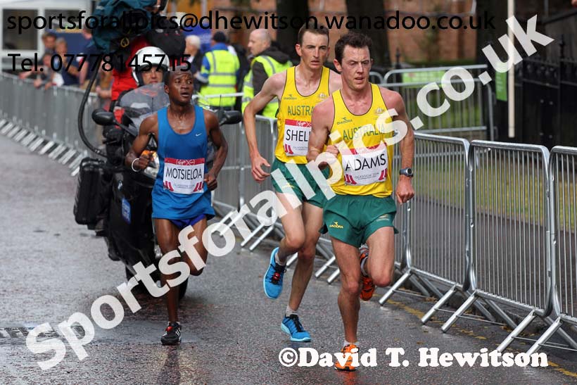 Liam Adams leads Michael Shelley (both Australia) in the mens Commonwealth Games Marathon, Glasgow. Photo: David T. Hewitson/Sports for All Pics